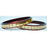 KKLKKL029 A pair of acrylic bangles/bracelete with golden bricks handiwork.