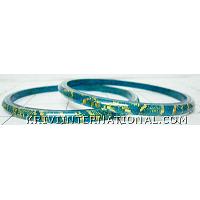 KKLKKL033 Pair of turquoise acrylic bangles with inlined fabric handiwork.