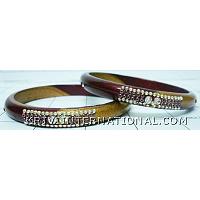 KKLKKLB35 Pair of lac bangles in dual colour with delicate stone handiwork.