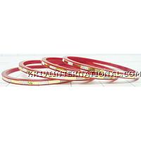 KKLKKN054 A set of 4 bangles with fabric and plate handiwork